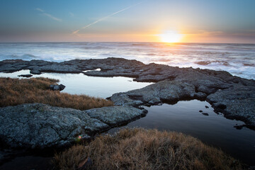 sunset on the rocky Oregon Coast