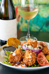 Coconut Shrimp Salad with cranberries and blue cheese