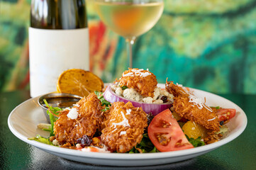 Coconut Shrimp Salad with cranberries and blue cheese