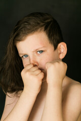 Boy posing ready to fight