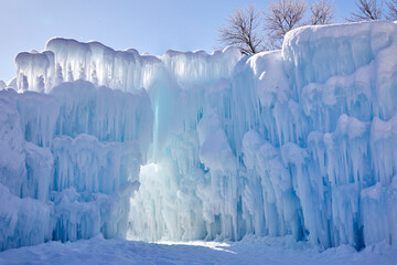 Beautiful large icicles covered with snow on a bitter cold day in winter in northern Minnesota USA