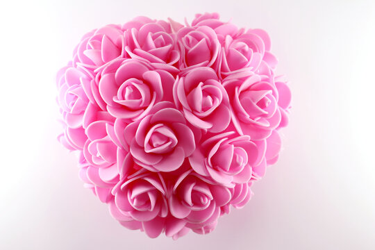 Pink heart with delicate rose flowers
