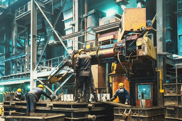 Heavy industry factory with workers with machine tool for iron cast molds. Industrial metalwork...