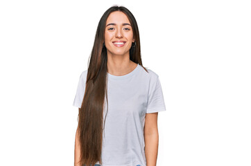 Young hispanic girl wearing casual white t shirt with a happy and cool smile on face. lucky person.