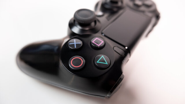 Sony DualShock 4 Controller for PS4 PlayStation 4 games console. Close up on buttons.