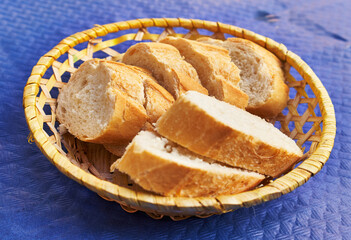  Tray with slices of bread on paper surface