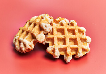  Bunch of delicious waffles over red background