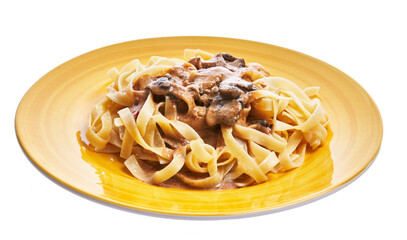  Plate of italian tagliatelle pasta with mushroom sauce isolated over white background