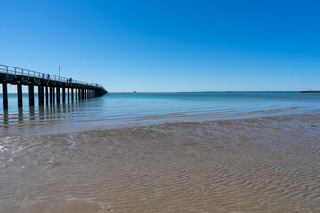 Ripples in the sand at low tide at Urangan Pier.