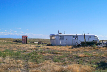 Fototapeta na wymiar Abandoned hut and trailer, ghost town, Cisco, Utah, USA