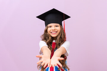 The joyful schoolgirl stretched out her hands forward. compulsory foreign education. admission to...
