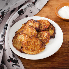 Yummy potato pancakes with cream eat food home dinner