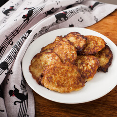 Yummy potato pancakes with cream eat food home dinner