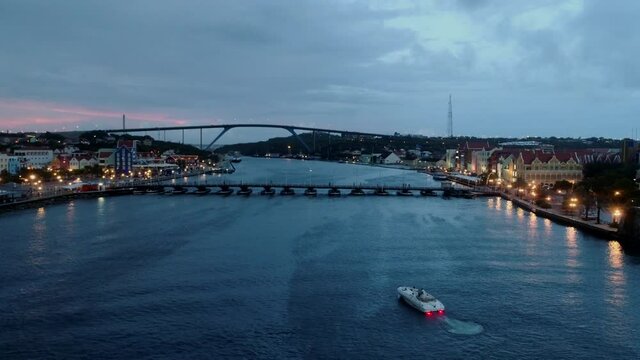 Boat entering Willemstad bay. capital city of Curaçao, a Dutch Caribbean island.