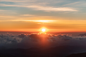 Fototapeta na wymiar Amazing Golden Sunrise With Amazing Views On The Top Of Sikunir Hills, Dieng Plateau, Central Java, Indonesia