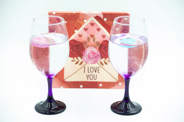 two glasses two hearts and gift