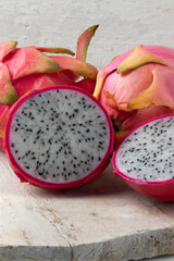 Ripe white dragon fruit on the table.