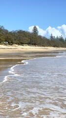 Ocean lapping on the sand