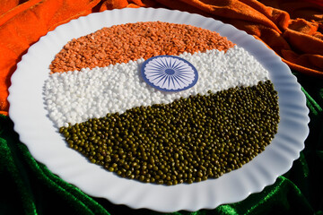 Happy republic day or Happy Indepence day theme concept wishes made with three types of lentils, masoor dal, whole green lentils and white sabudana