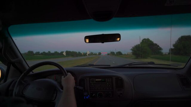 Interior View of Truck Driving at at Dusk