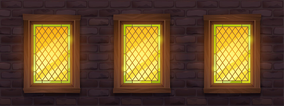 Old brick wall with glow stained glass windows at night. Vector cartoon illustration of medieval building facade with mosaic windows in wooden frame and stone wall