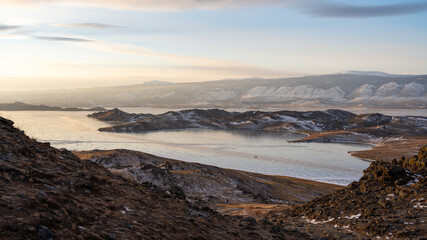 landscape in the mountains and frozen lake