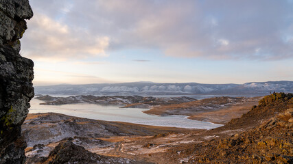 landscape in the mountains and frozen lake