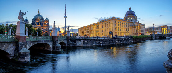 Panorama of the Berlin Cathedral, the TV Tower and the reconstructed City Palace before sunrise © elxeneize