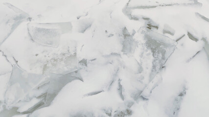 Naklejka na ściany i meble Snow and ice background, winter season texture