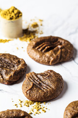 Protein homemade chocolate chip cookies on white marble background. Pea protein recipe.