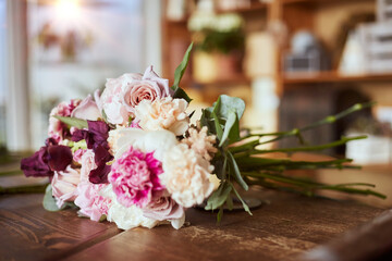 Fresh pink wedding bouquet made in flower shop