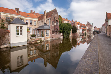 Beautiful houses along the canals of Brugge, Belgium. Tourism destination in Europe