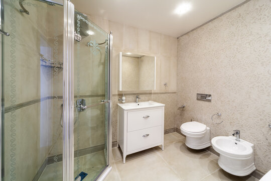 Clean bright stylish design modern bathroom. Bathroom interior in luxury home with glass shower
