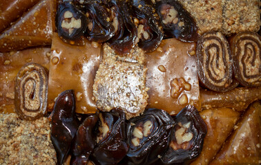 various walnut, pistachio, hazelnut pestils. Turkish deserts. similar to turkish delight.
