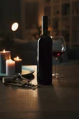 Keuken spatwand met foto Excellent red wine tasting at night © stokkete