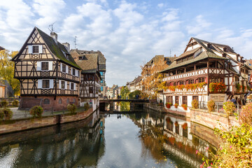Fototapeta na wymiar La Petite France historical half-timbered houses at river Ill water Alsace in Strasbourg