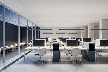 Modern coworking office interior with empty computer monitors on wooden desks, equipment, furniture and panoramic windows. 3D Rendering.