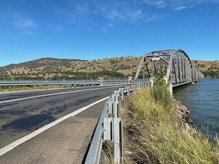 Fototapeta na wymiar The Bethanga or BellBridge Bridge is a steel truss road bridge that carries the Riverina Highway across Lake Hume, an artificial lake on the Murray River in Australia.
