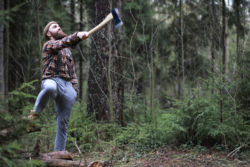 A bearded lumberjack with a large ax
