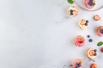 Background with cupcakes, copy space