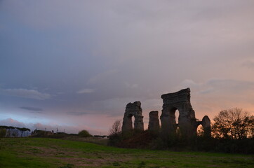 Photos taken at sunset while on a stroll through the beautiful Aqueducts Park in Rome, with the majestic ruins of ancient Roman aqueducts and trees