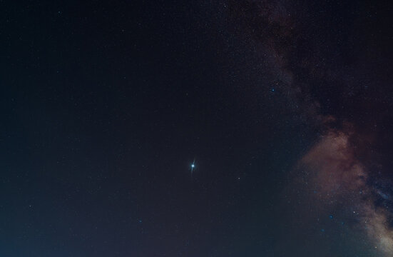 night sky milky way and star on dark background. Vulpecula is a faint constellation in the northern sky. Its name is Latin for little fox.The Dumbbell Nebula is a planetary nebula in the constellation