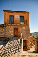 A street among the characteristic houses of Casalbore, a mountain village in the province of Avellino, Italy.