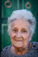 Aged candid woman close up portrait , high photo 