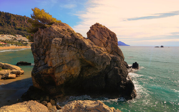 rocky greek coast, popular sandy Kontogialos (Pelekas) beach near Ermones village, Corfu (Kerkyra)  island, Greece, Europe