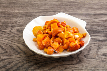 Marinated pickled honey mushrooms in the bowl