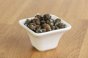 Salted marinated capers snack appetiser