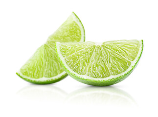 two lime slices on a white isolated background