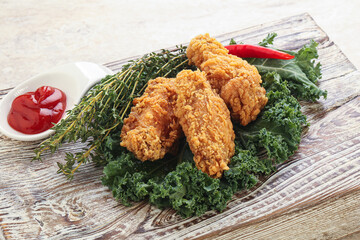 Crispy chicken wings with tomato ketchup