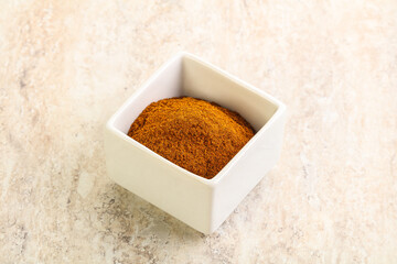 Dry Paprika powder in the bowl